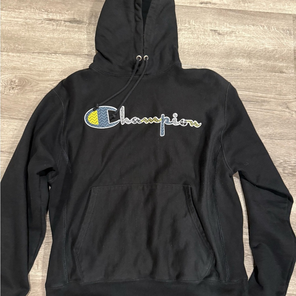 Champion Black Hoodie with Blue and Yellow Logo
